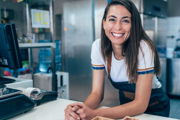 Small business owner looking at camera