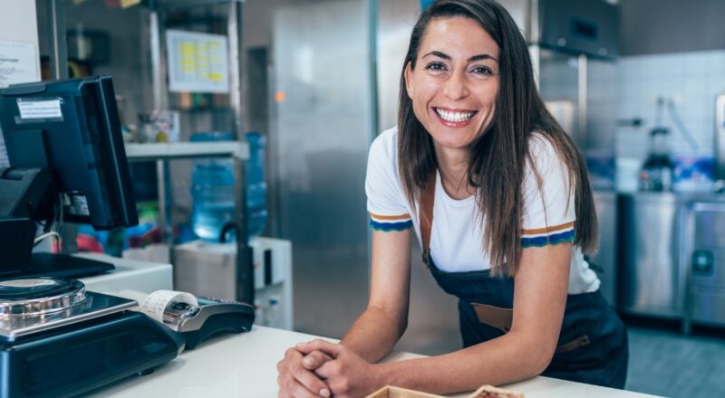 Small business owner looking at camera
