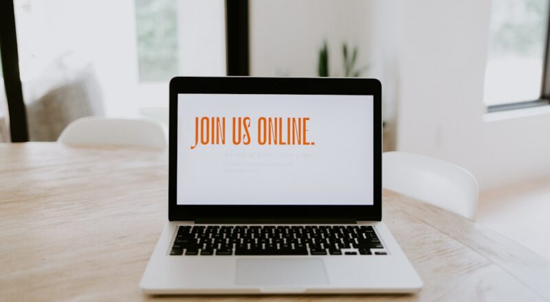 Image of computer with "join us online" text featured